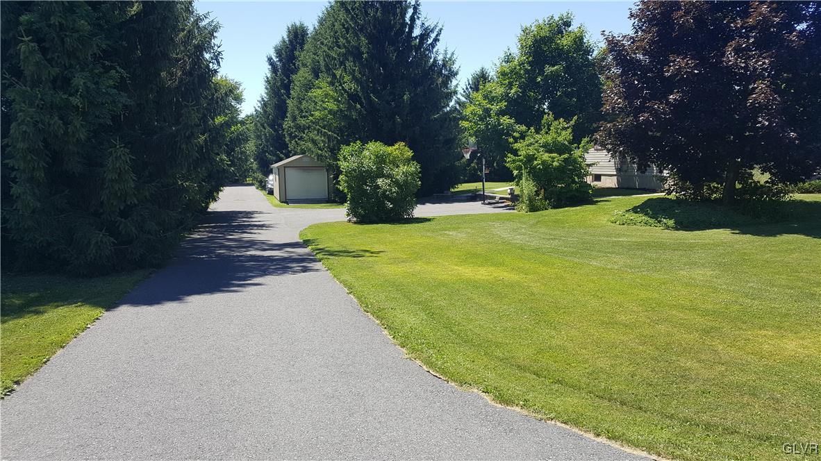 975 Bushkill Center Road Nazareth, PA 18064 - Photo 3 of 48 a view of a yard with plants and trees