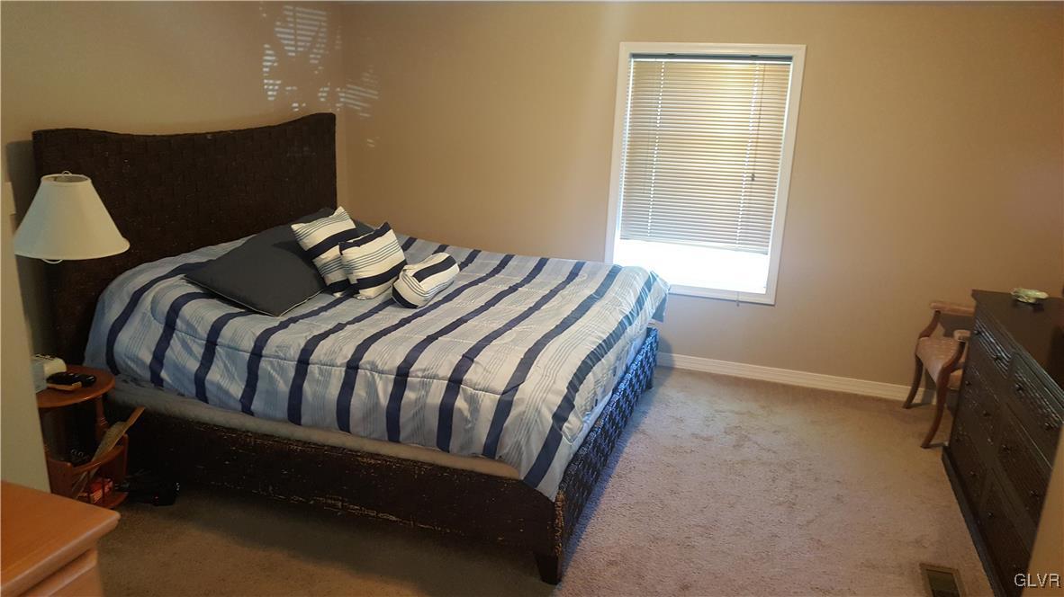 975 Bushkill Center Road Nazareth, PA 18064 - Photo 32 of 48 a bedroom with a bed and a window
