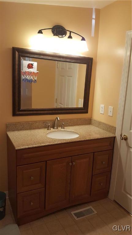 975 Bushkill Center Road Nazareth, PA 18064 - Photo 33 of 48 a bathroom with a sink and a mirror