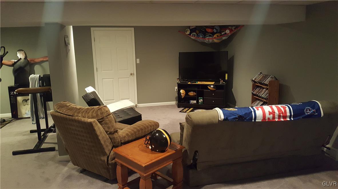 975 Bushkill Center Road Nazareth, PA 18064 - Photo 40 of 48 a living room with furniture and a flat screen tv