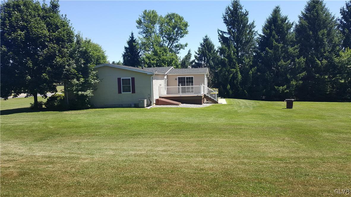 975 Bushkill Center Road Nazareth, PA 18064 - Photo 10 of 48 a view of a house with a yard and trees