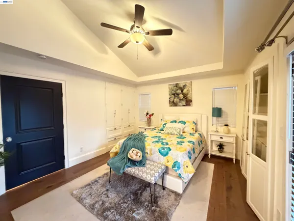 a bed room with a bed and a window