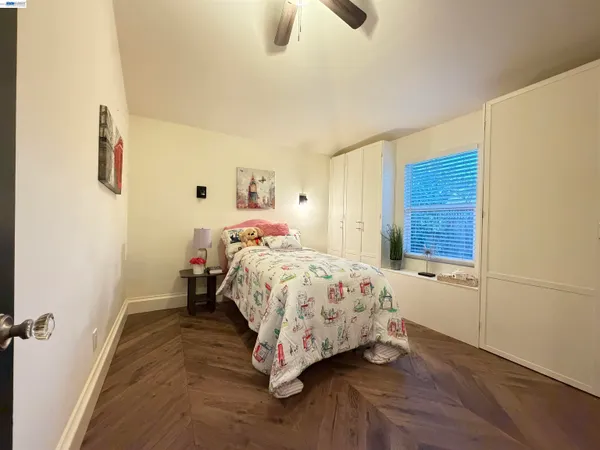 a bedroom with a bed and a closet