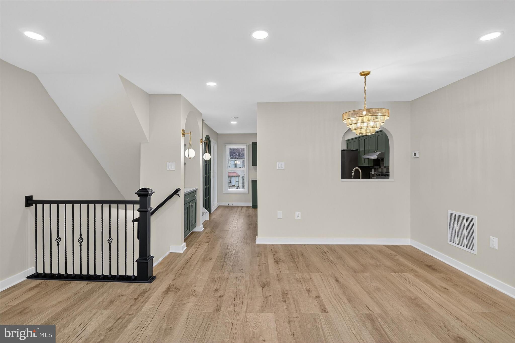 10502 Oronoco Lane Manassas, VA 20109 - Photo 16 of 37 a view of a room with wooden floor