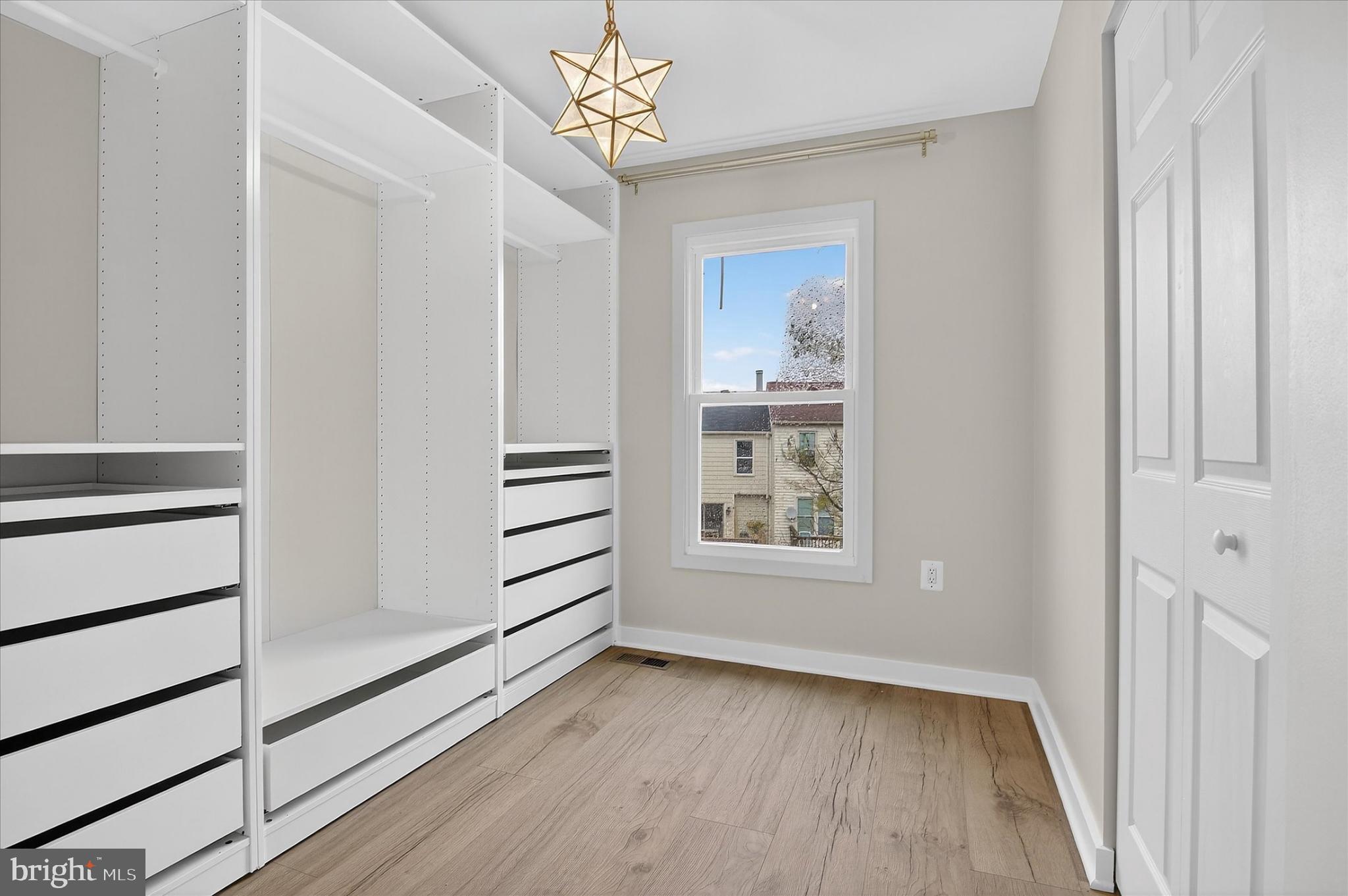 10502 Oronoco Lane Manassas, VA 20109 - Photo 29 of 37 wooden floor in an empty room with a window