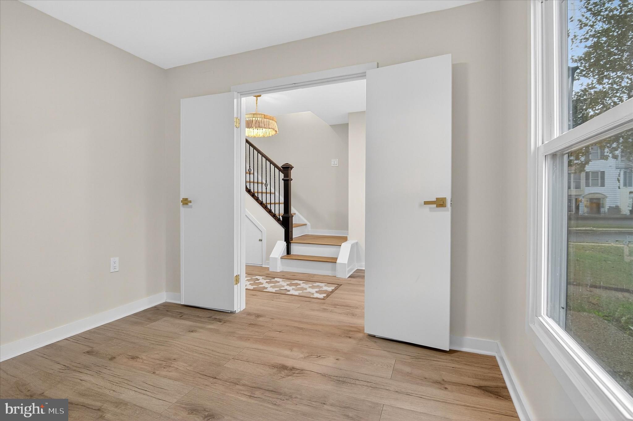 10502 Oronoco Lane Manassas, VA 20109 - Photo 9 of 37 a view of entryway and hall with wooden floor