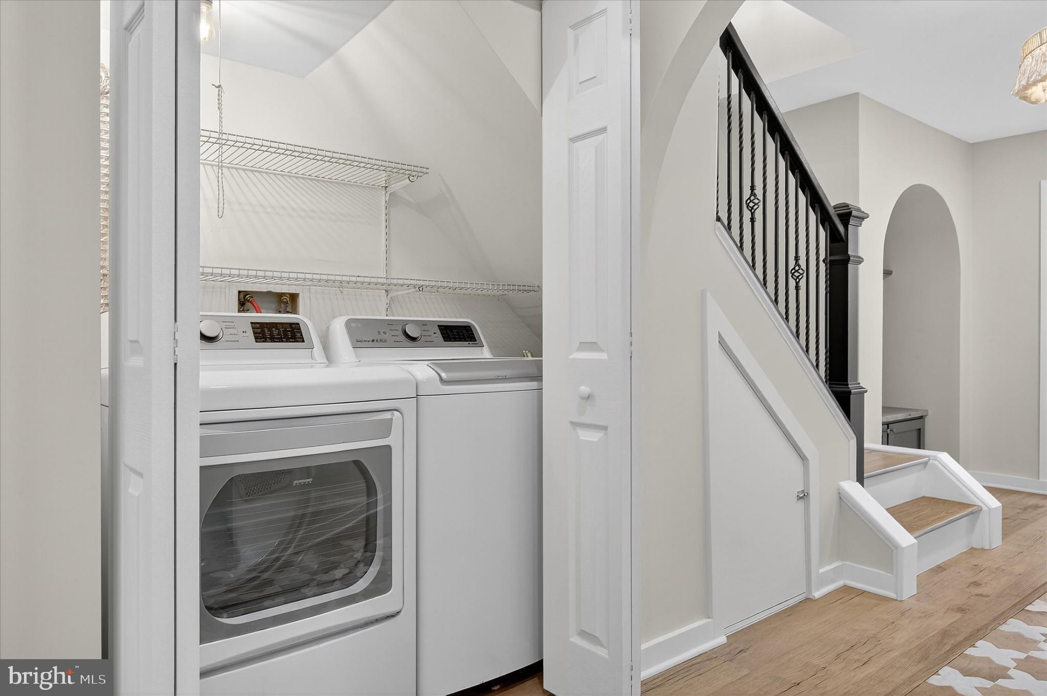 10502 Oronoco Lane Manassas, VA 20109 - Photo 10 of 37 a view of a hallway with washer and dryer