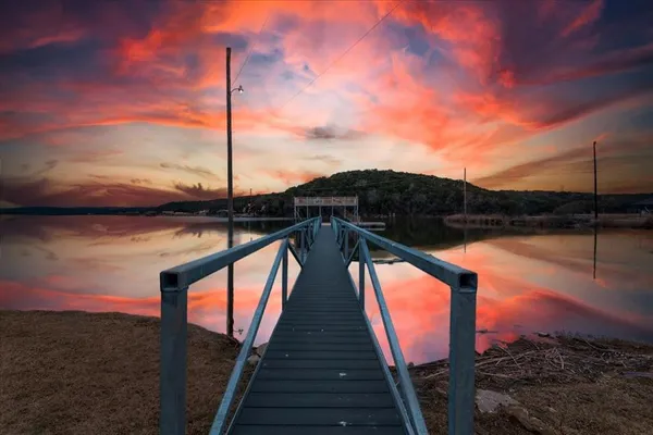 a view of a balcony with an ocean