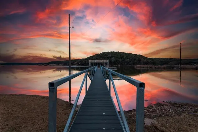 a view of a balcony with an ocean