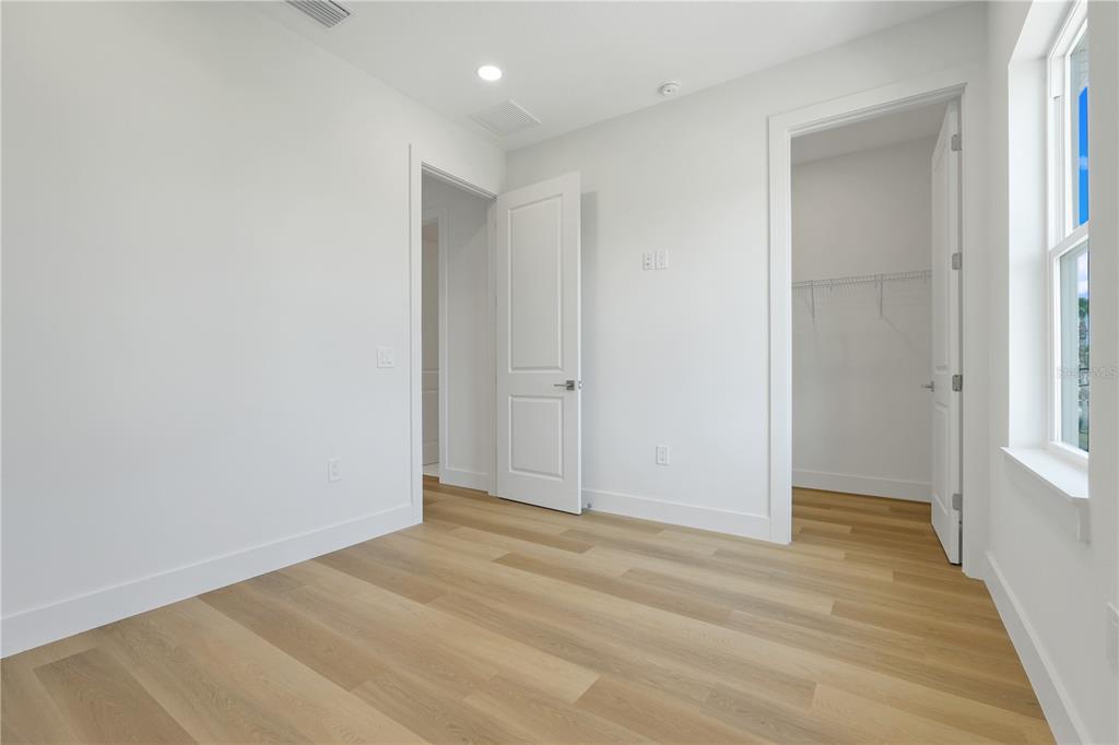 3496 Amberjack Drive Hernando Beach, FL 34607 - Photo 25 of 52 a view of an empty room with wooden floor