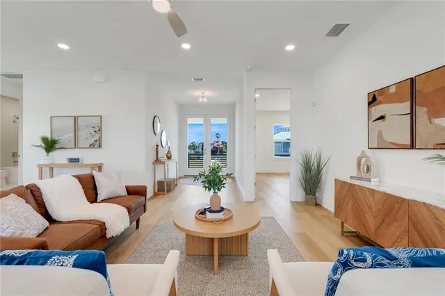a living room with furniture and a table