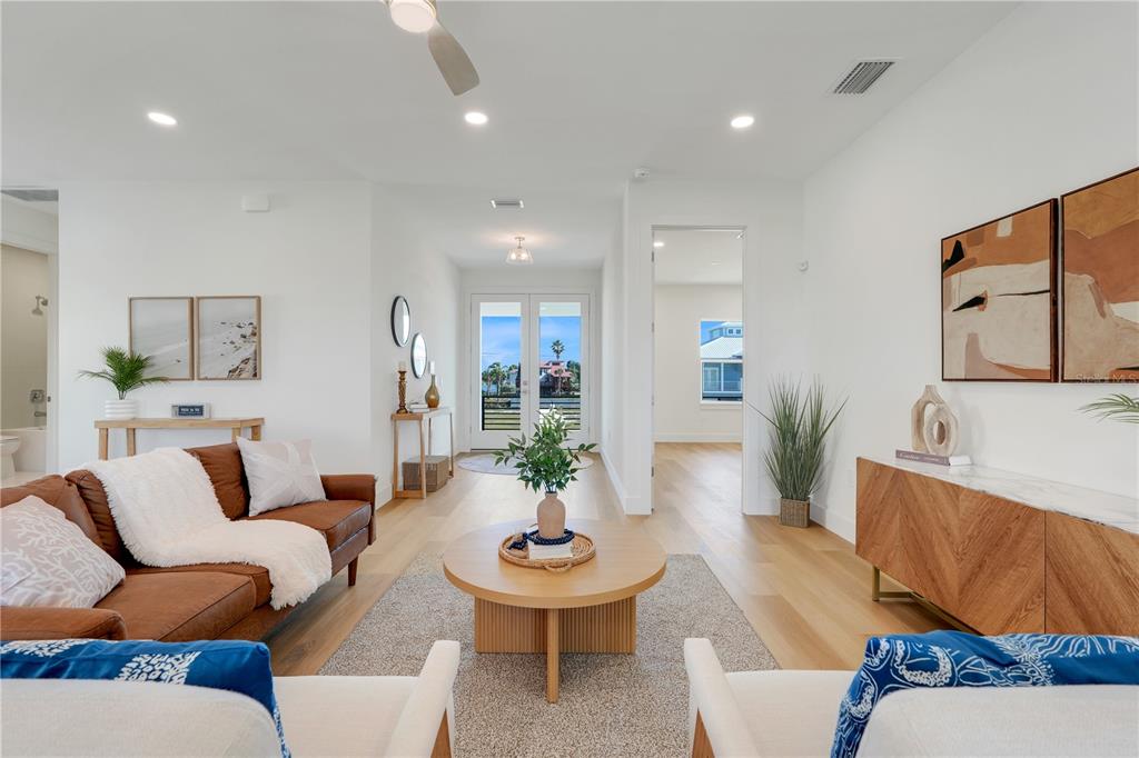 3496 Amberjack Drive Hernando Beach, FL 34607 - Photo 7 of 52 a living room with furniture and a table