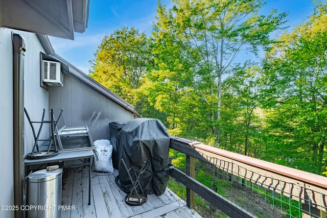 a view of a backyard with sitting area