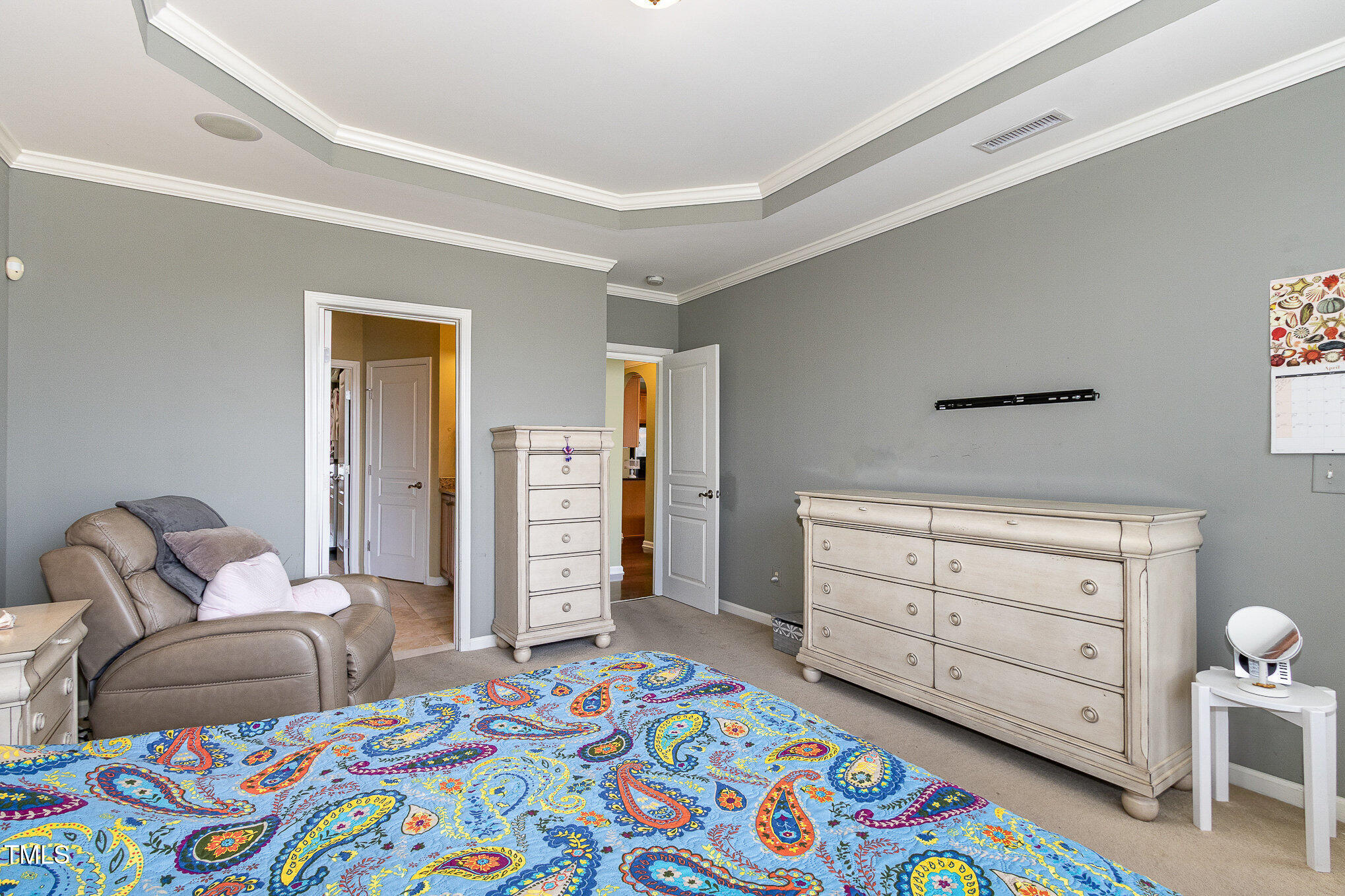 9207 Wooden Road Raleigh, NC 27617 - Photo 13 of 27 a bedroom with a bed and furniture