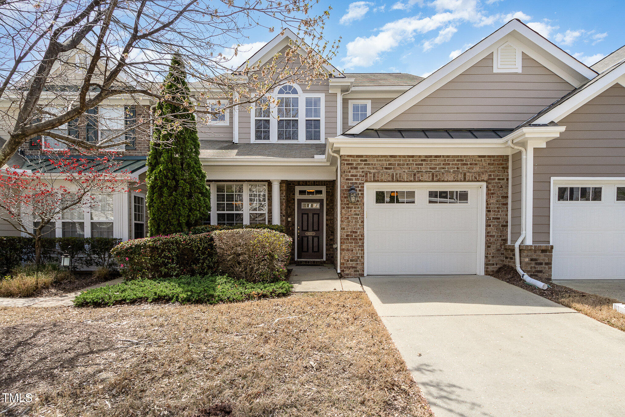 9207 Wooden Road Raleigh, NC 27617 - Photo 2 of 27 a house view with a outdoor space
