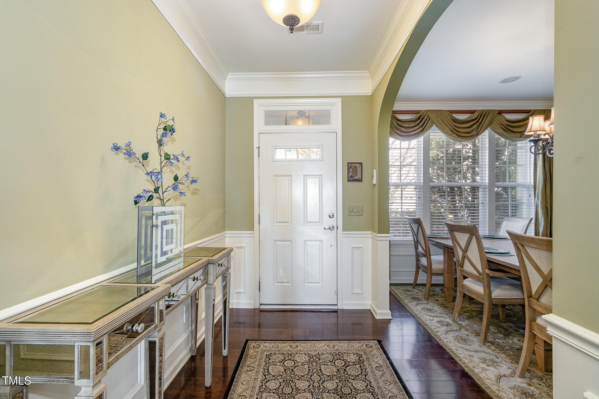 9207 Wooden Road Raleigh, NC 27617 - Photo 5 of 27 a view of an entryway with wooden floor