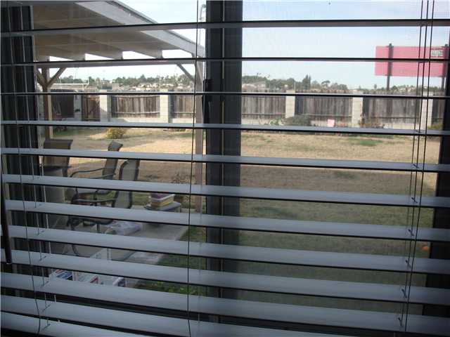 1333 Walbollen Street Spring Valley, CA 91977 - Photo 10 of 14 View to the back yard from the kitchen.