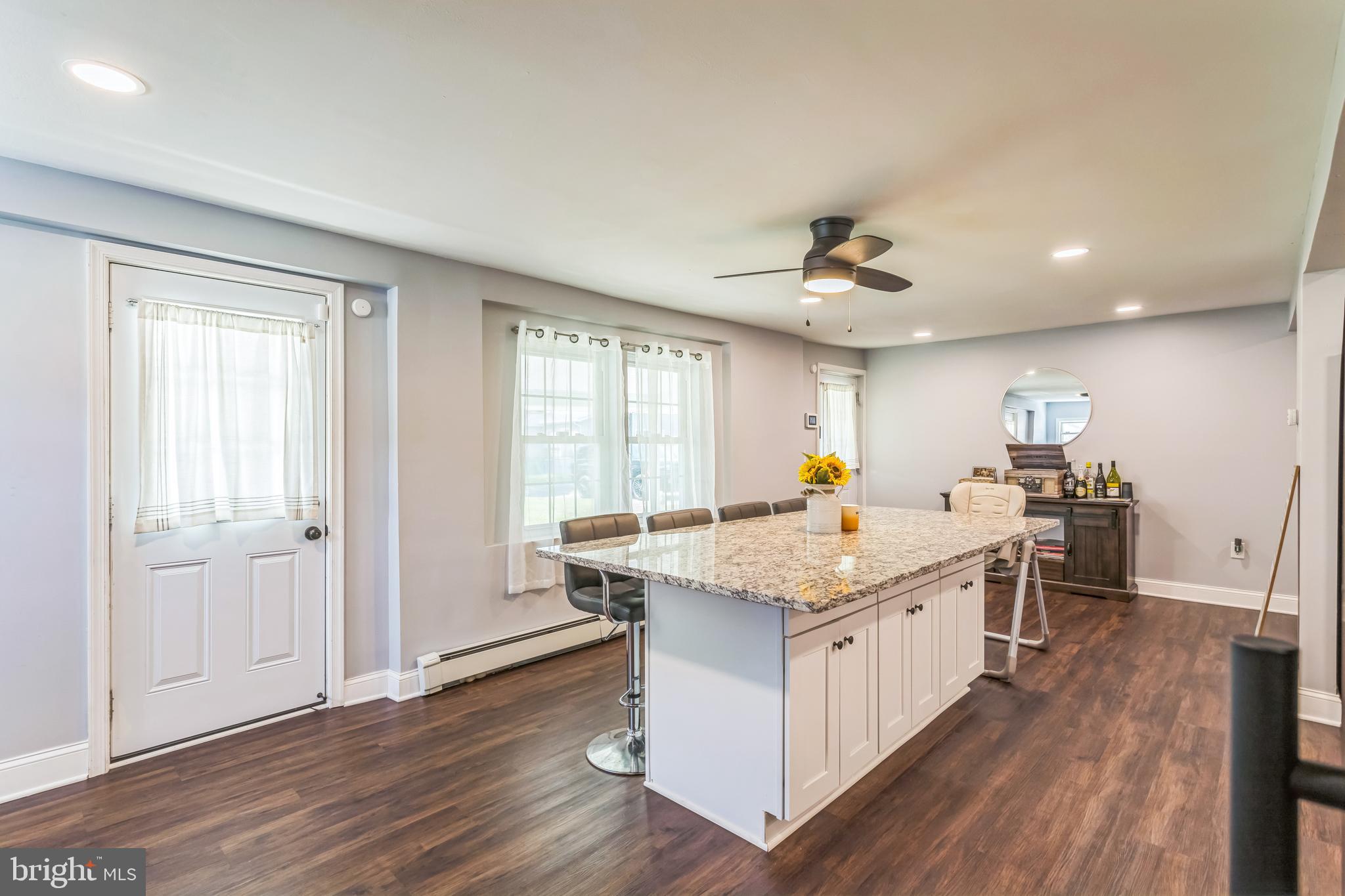414 Delaware Avenue Croydon, PA 19021 - Photo 16 of 34 a kitchen with stainless steel appliances granite countertop a sink stove and wooden floor