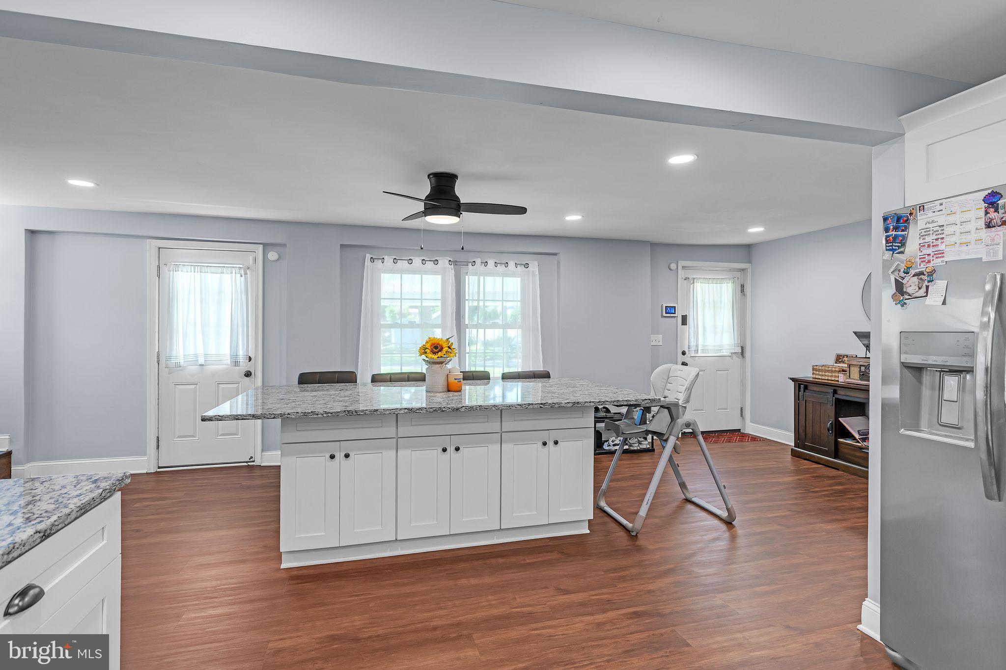 414 Delaware Avenue Croydon, PA 19021 - Photo 19 of 34 a open kitchen with stainless steel appliances granite countertop a sink and cabinets