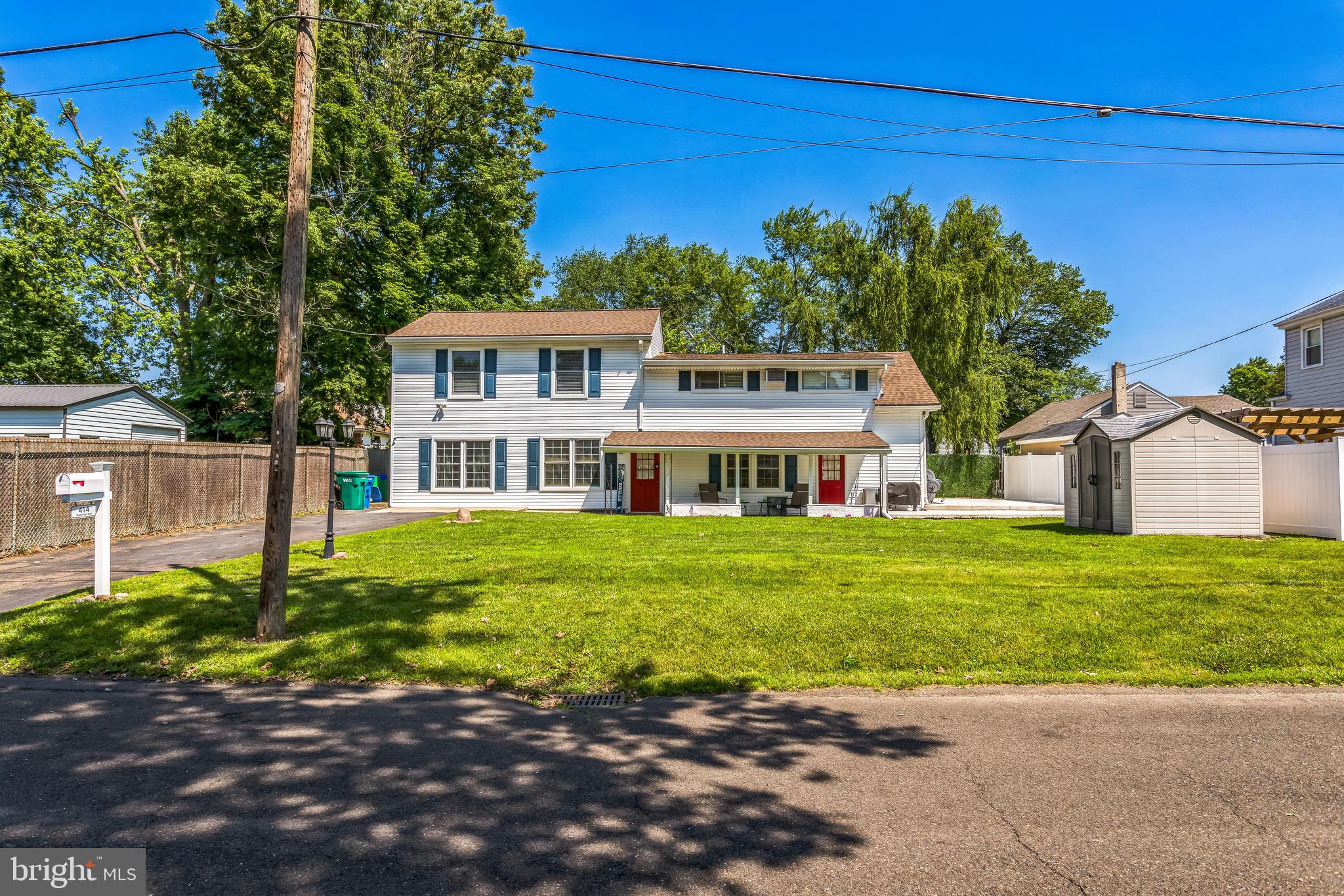 414 Delaware Avenue Croydon, PA 19021 - Photo 33 of 34 a front view of a house with a garden