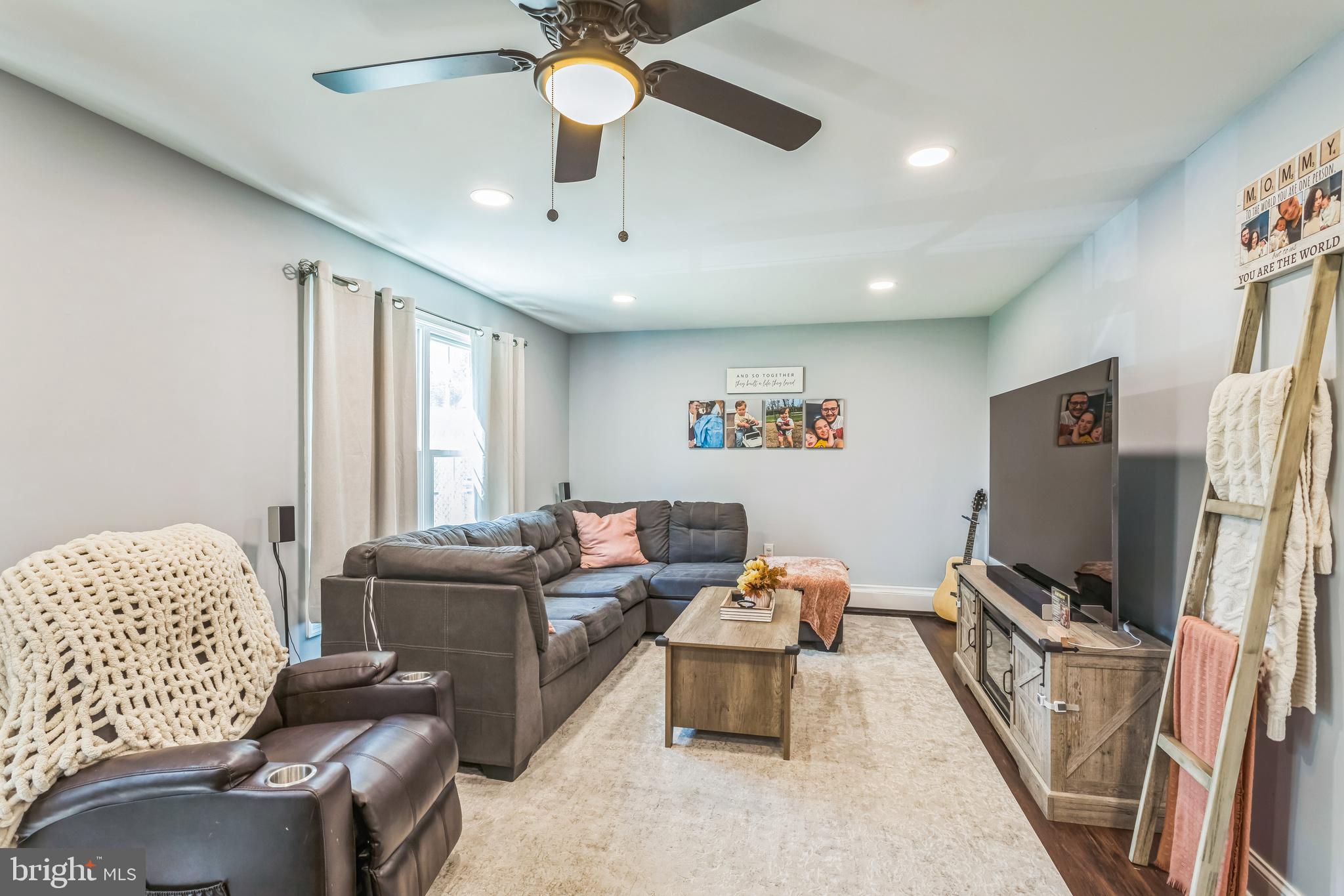414 Delaware Avenue Croydon, PA 19021 - Photo 7 of 34 a living room with furniture and a flat screen tv