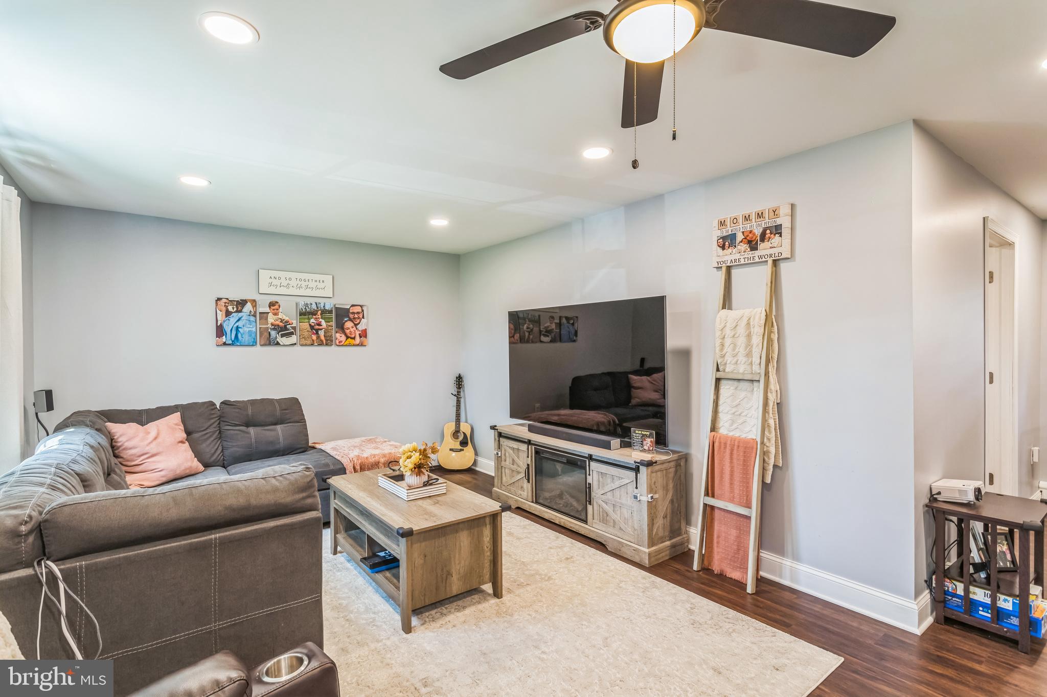 414 Delaware Avenue Croydon, PA 19021 - Photo 8 of 34 a living room with furniture and a flat screen tv