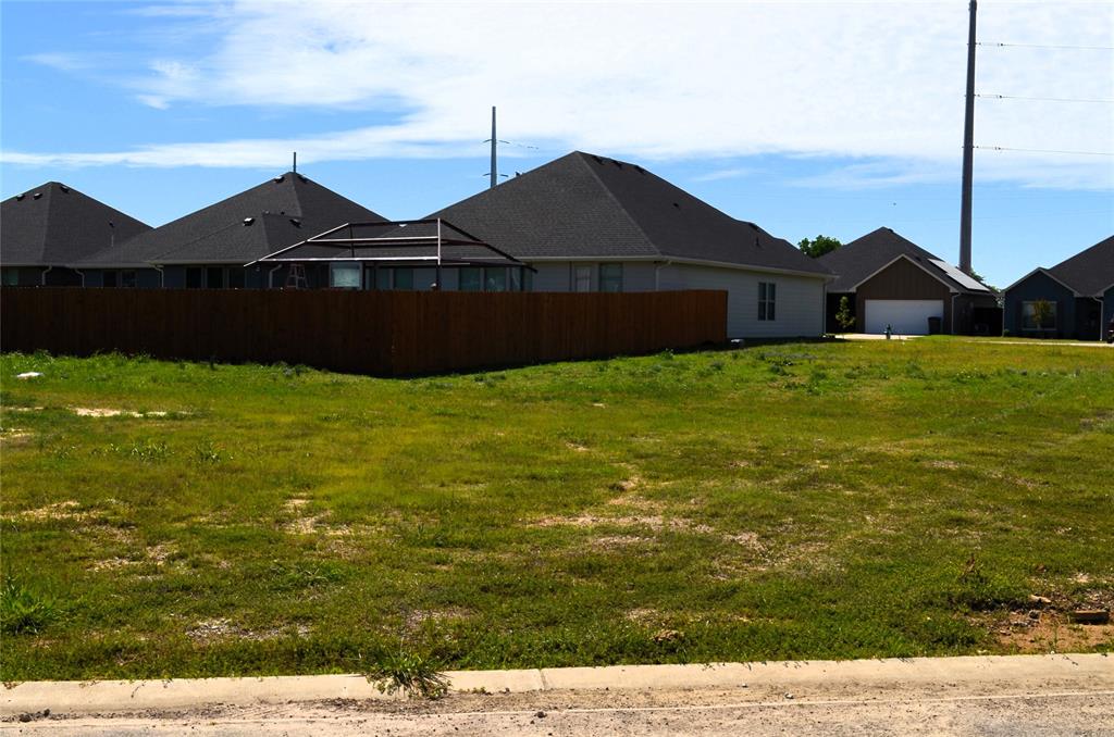 321 Preston Road Mabank, TX 75147 - Photo 4 of 5 a view of a house with a yard