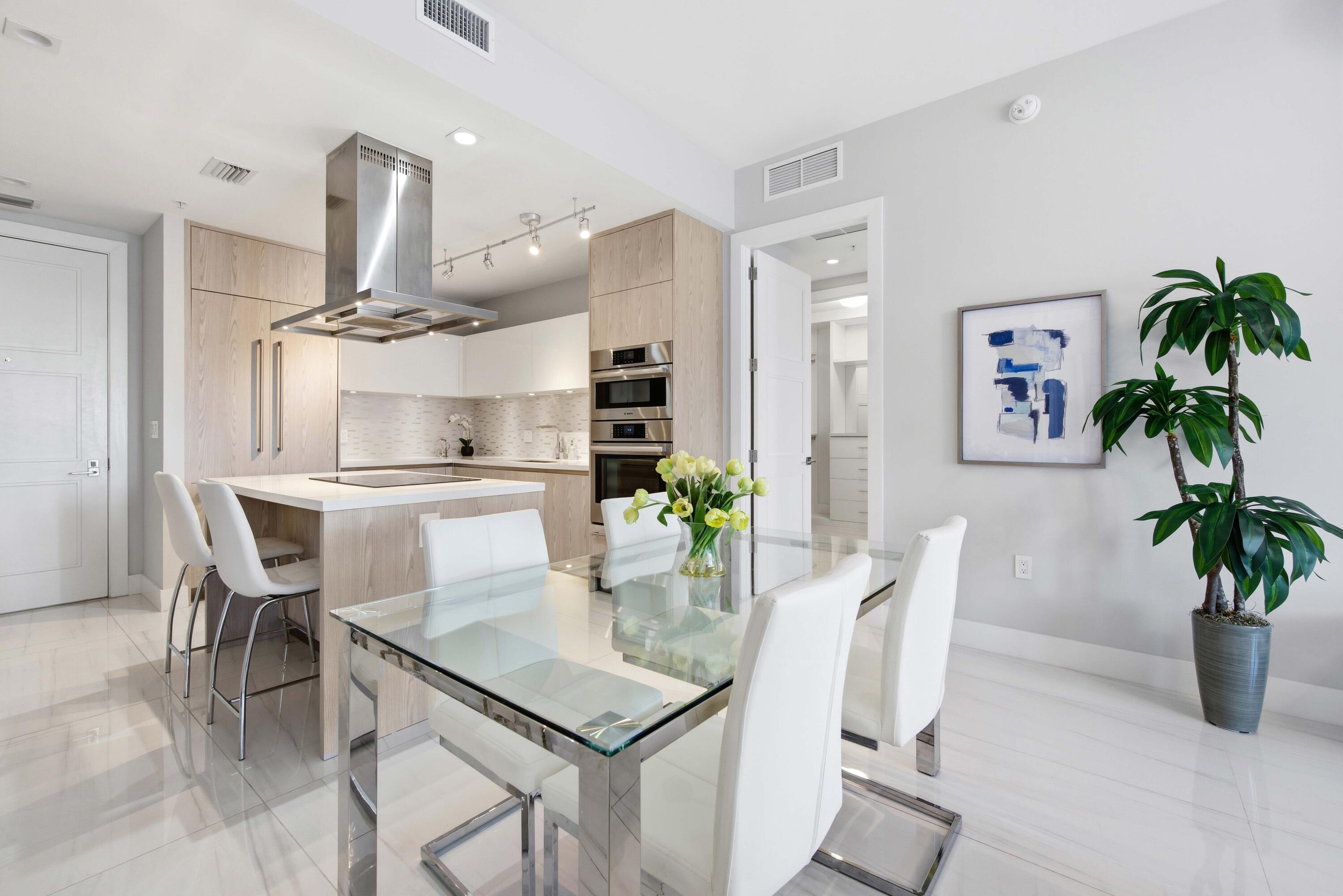 155 East Boca Raton Road, Unit 313 Boca Raton, FL 33432 - Photo 12 of 72 a dining room with furniture and window