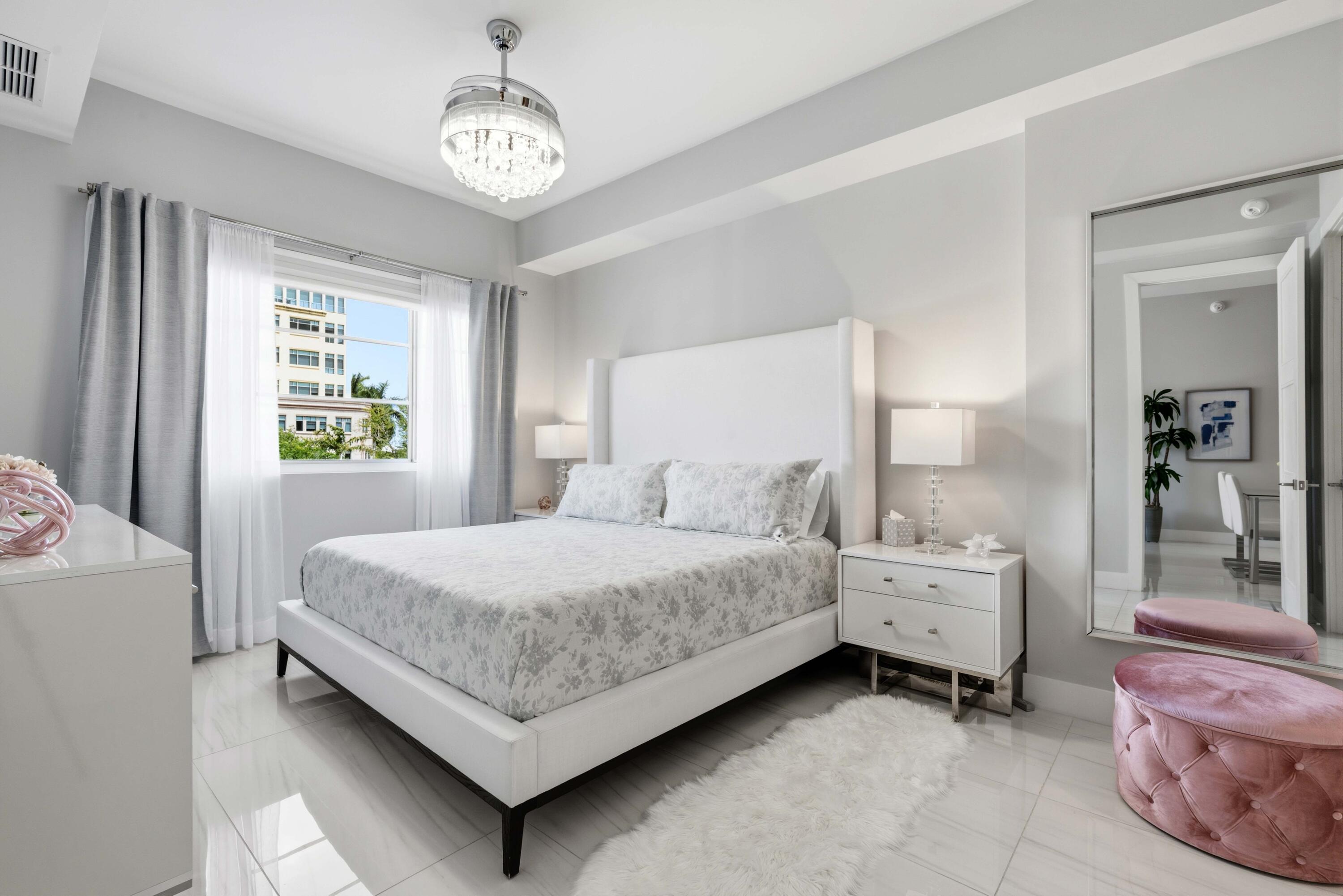 155 East Boca Raton Road, Unit 313 Boca Raton, FL 33432 - Photo 43 of 72 a bedroom with a bed and a table