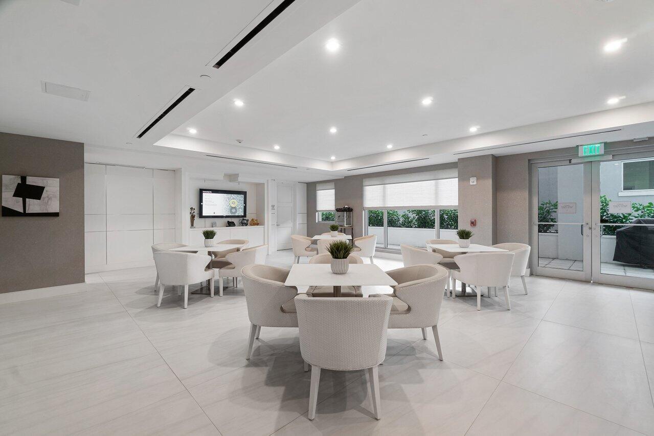 155 East Boca Raton Road, Unit 313 Boca Raton, FL 33432 - Photo 63 of 72 a view of a dining room with furniture window and outside view