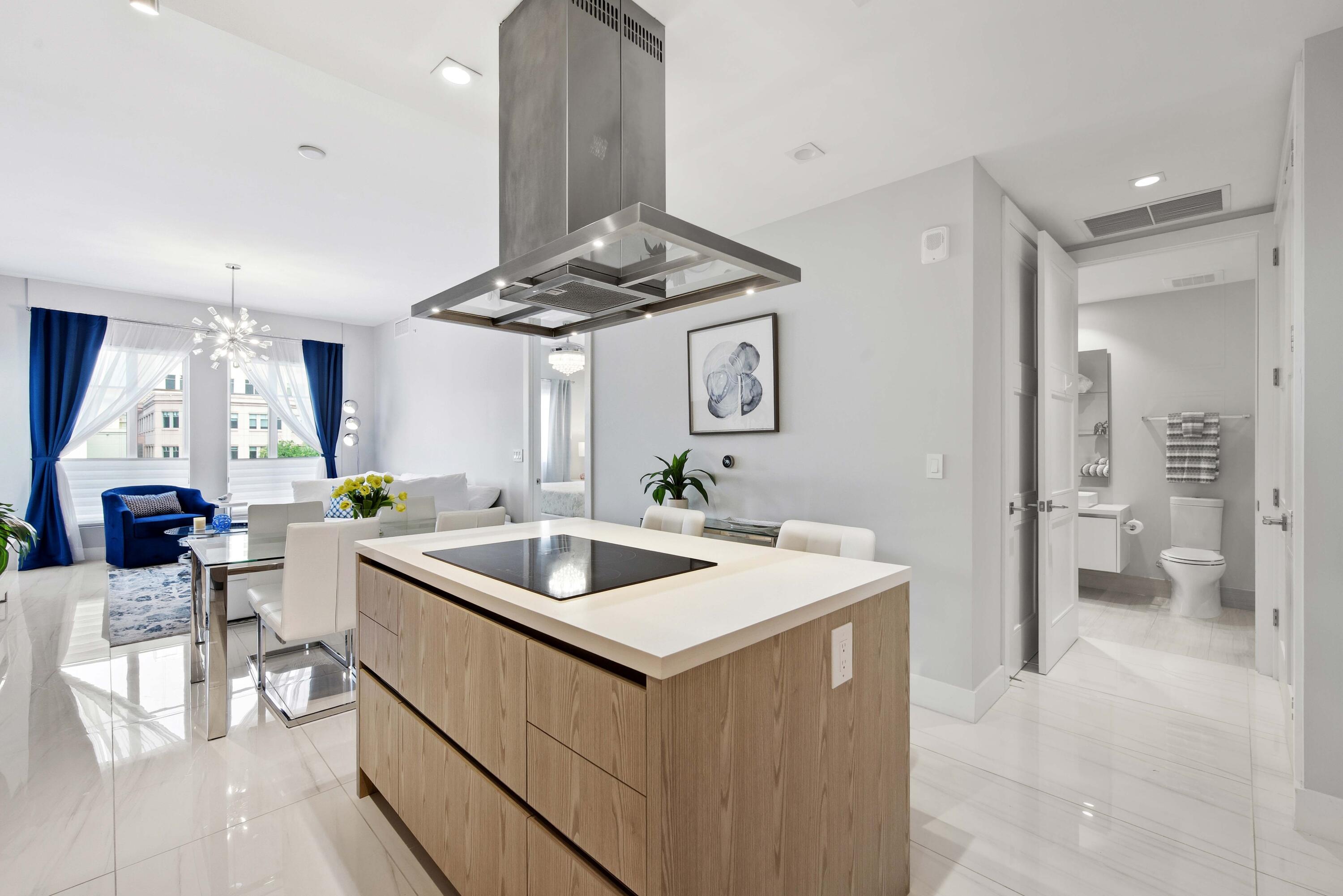 155 East Boca Raton Road, Unit 313 Boca Raton, FL 33432 - Photo 9 of 72 a kitchen with a sink and stove