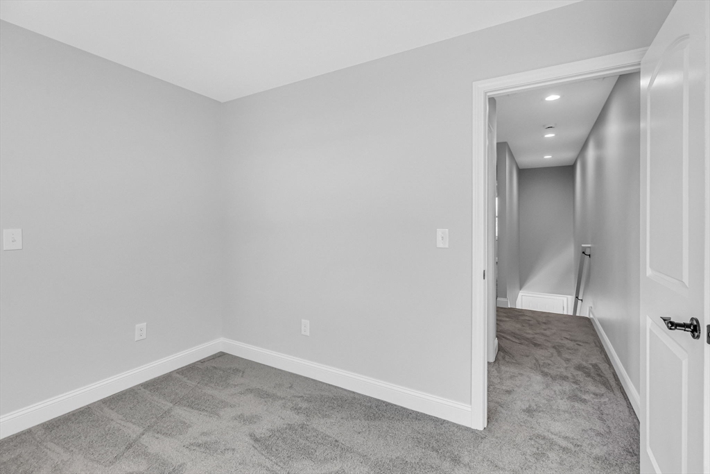 211-213 Pine Street Springfield, MA 01105 - Photo 14 of 25 an empty room with a bench and a sink