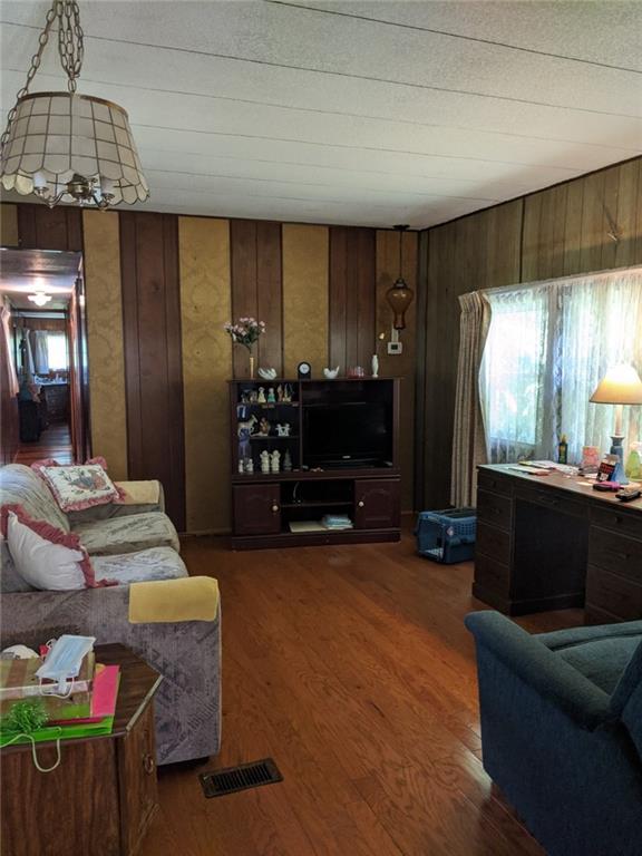 197 Heller Road Butler, PA 16002 - Photo 2 of 9 LIVING ROOM FEATURES HARDWOOD FLOORING AND NEWER THERMO PANE WINDOWS.