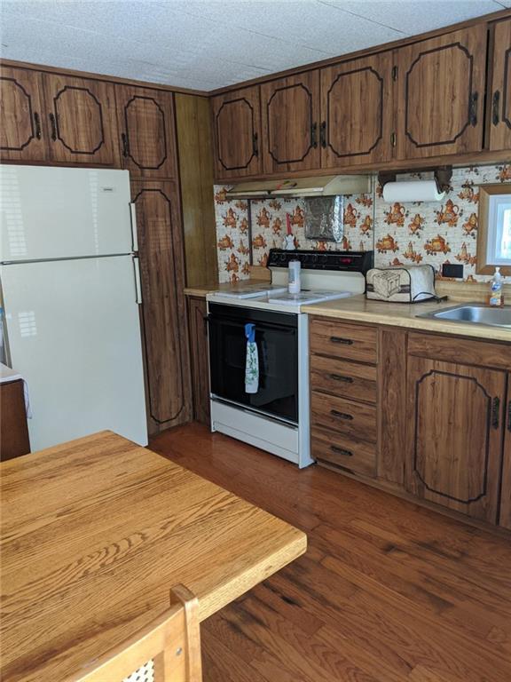 197 Heller Road Butler, PA 16002 - Photo 3 of 9 KITCHEN IS BRIGHT AND ALSO HAS HARDWOOD FLOORING.