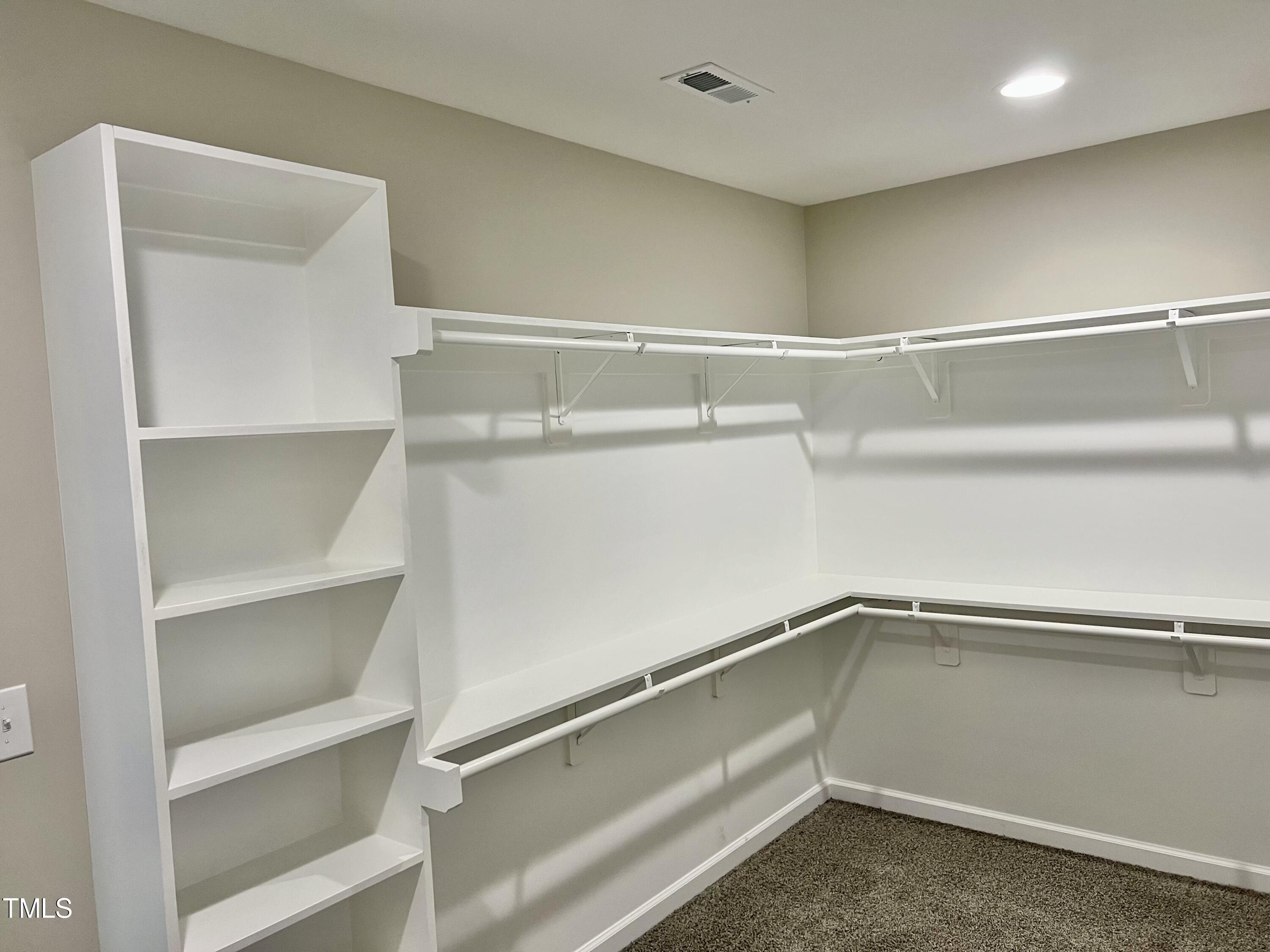 45 Summit Court Cameron, NC 28326 - Photo 13 of 19 a view of an empty walk in closet