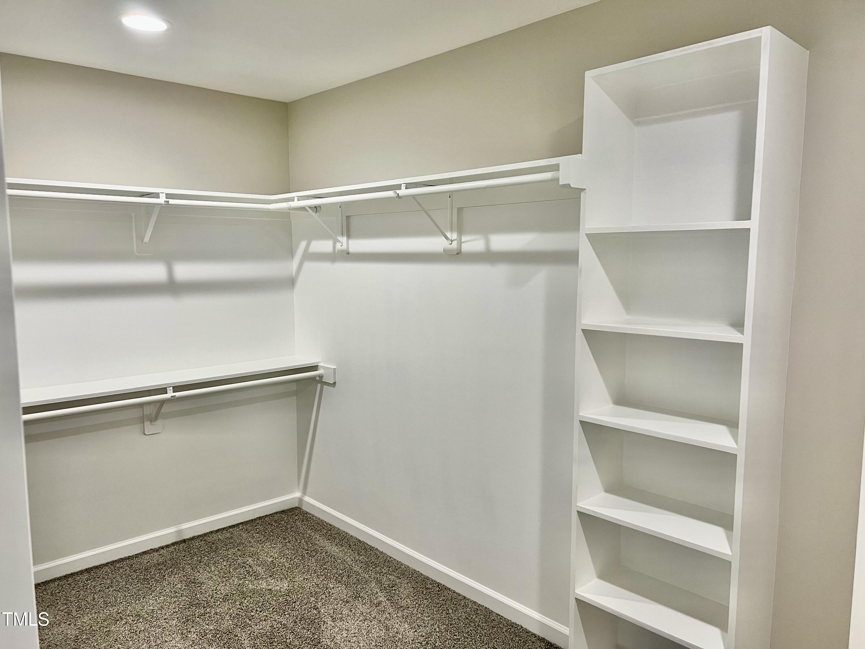45 Summit Court Cameron, NC 28326 - Photo 14 of 19 a view of an empty walk in closet