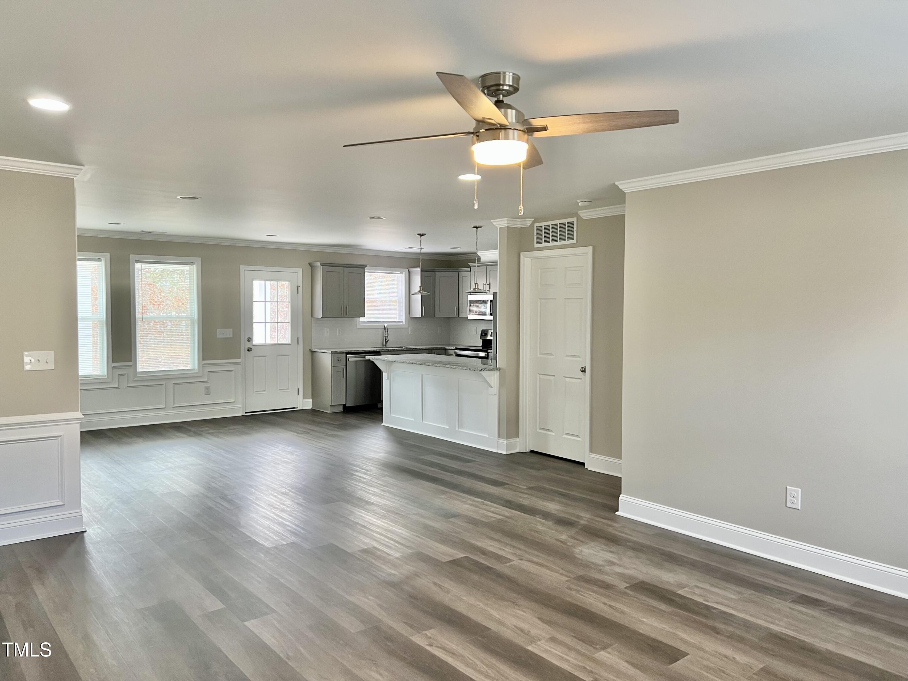 45 Summit Court Cameron, NC 28326 - Photo 2 of 19 a view of a kitchen with wooden floor and a kitchen