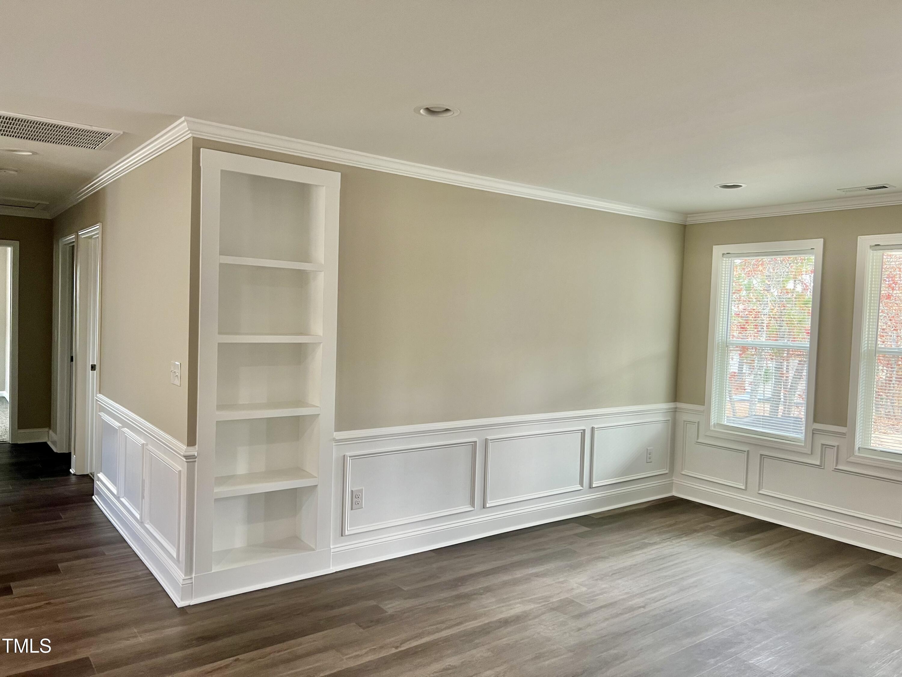 45 Summit Court Cameron, NC 28326 - Photo 3 of 19 a view of an empty room with wooden floor and window