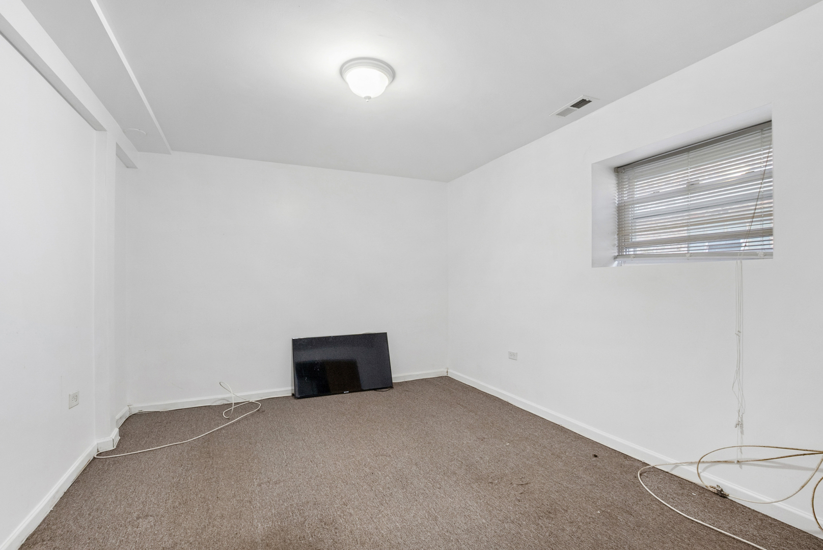 8040 South May Street Chicago, IL 60620 - Photo 14 of 23 a view of an empty room