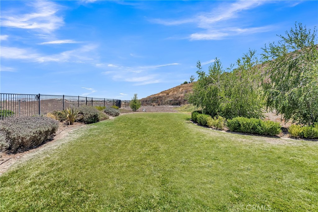 12237 Cortona Place Riverside, CA 92503 - Photo 15 of 17 a view of a field with an ocean