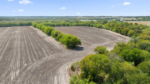 a view of a lake with a big yard