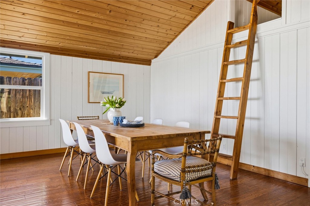 3448 Studio Drive Cayucos, CA 93430 - Photo 12 of 47 a view of a dining room with furniture and wooden floor