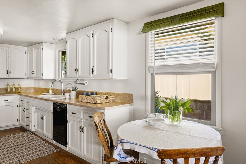 3448 Studio Drive Cayucos, CA 93430 - Photo 16 of 47 a view of a kitchen area with furniture and a window