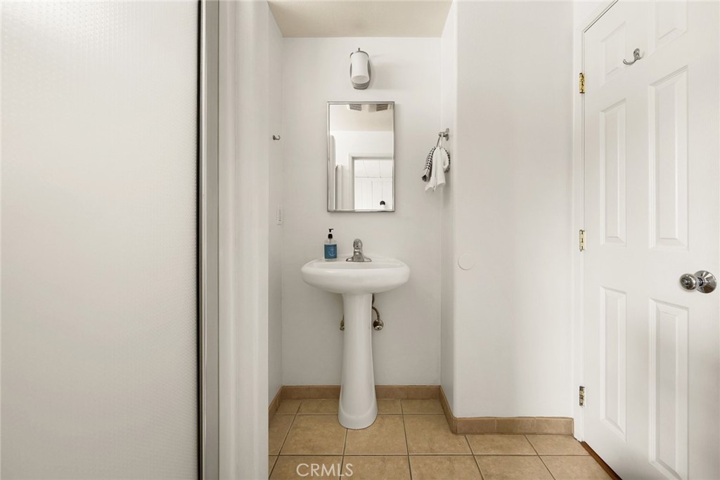 3448 Studio Drive Cayucos, CA 93430 - Photo 22 of 47 a bathroom with a sink and a mirror