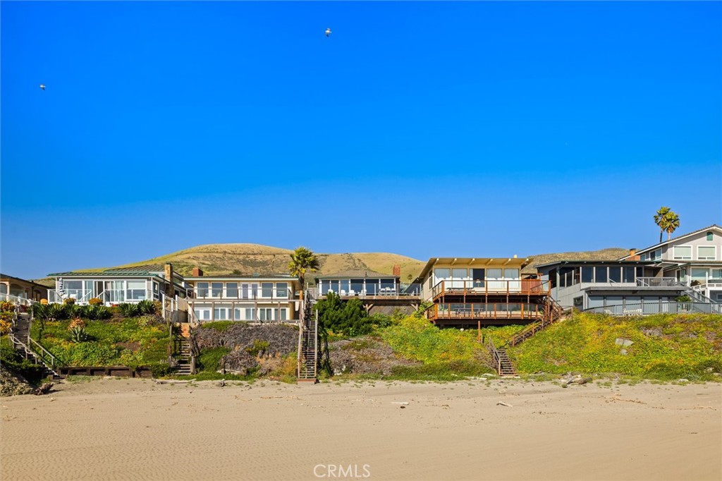 3448 Studio Drive Cayucos, CA 93430 - Photo 32 of 47 a view of a building with a ocean view