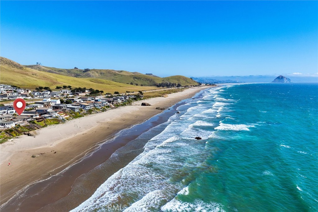 3448 Studio Drive Cayucos, CA 93430 - Photo 35 of 47 a view of a lake with a mountain