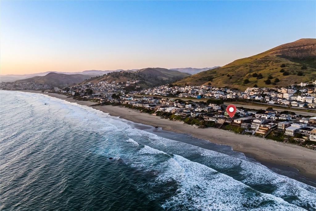 3448 Studio Drive Cayucos, CA 93430 - Photo 40 of 47 a city view with mountains in the background