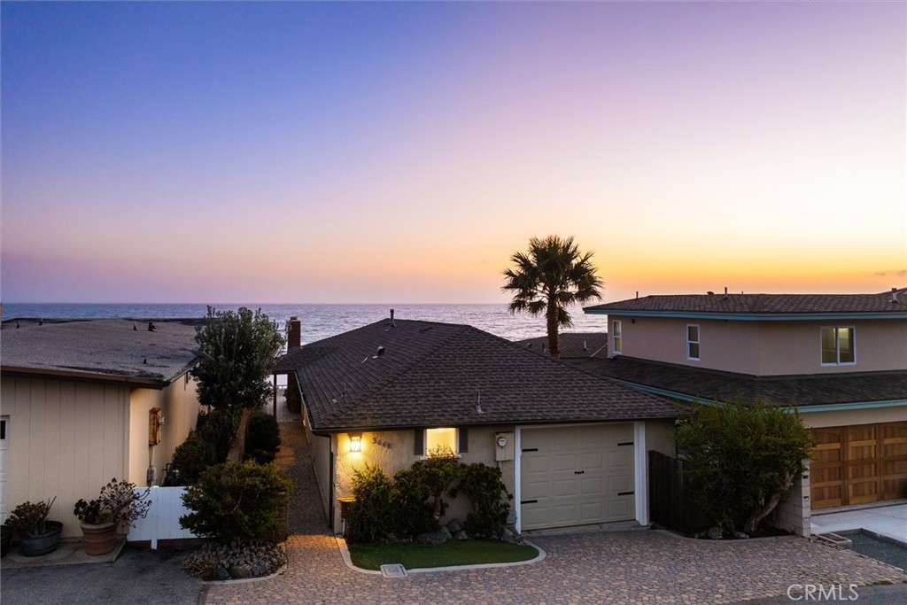 3448 Studio Drive Cayucos, CA 93430 - Photo 4 of 47 a front view of a house with a yard