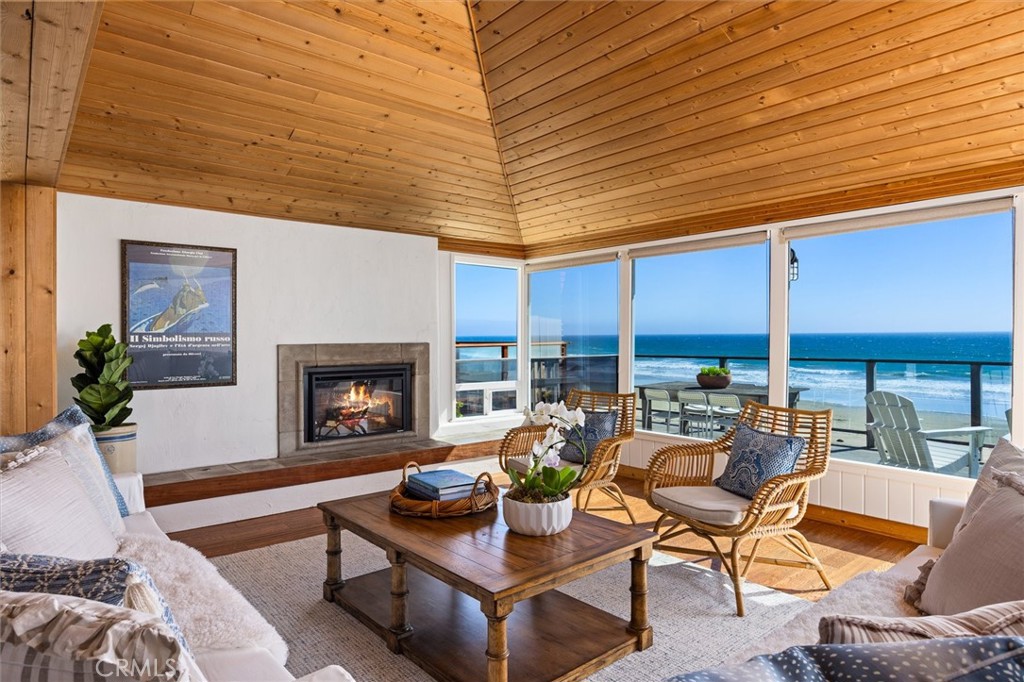 3448 Studio Drive Cayucos, CA 93430 - Photo 5 of 47 a living room with furniture and a fireplace