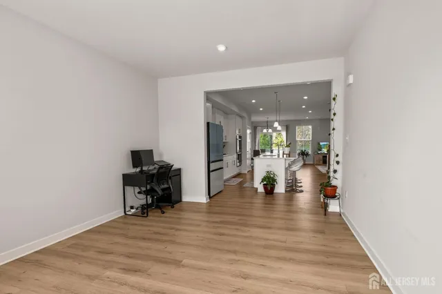 a view of dining room with wooden floor